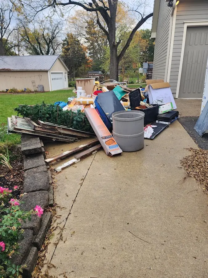 Dumpster being loaded with debris for 3 Yard Dumpster Rental in East Wenatchee